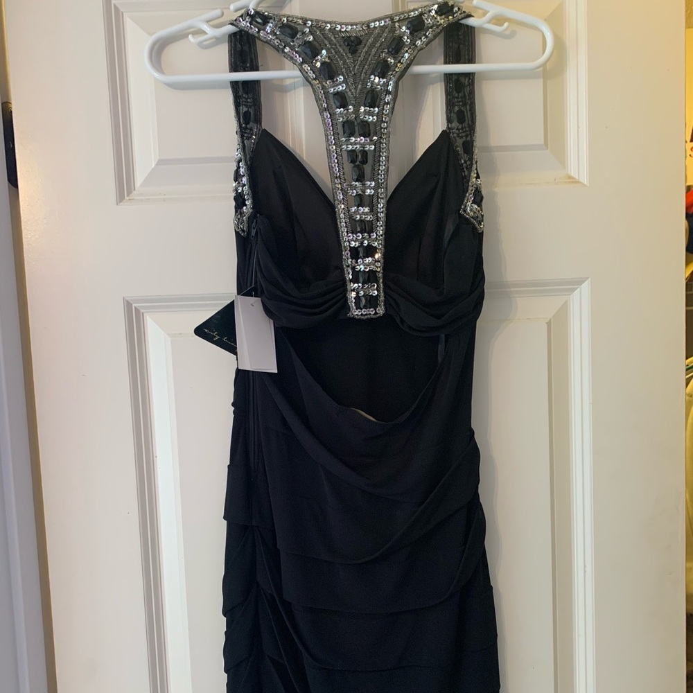 black dress with silver and black sequin straps